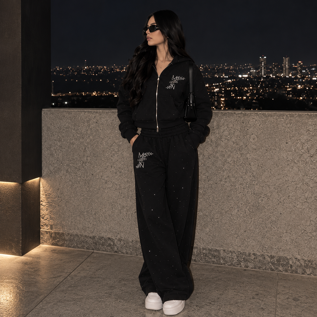 Model wearing M&N Orgullo black rhinestone zip-up hoodie